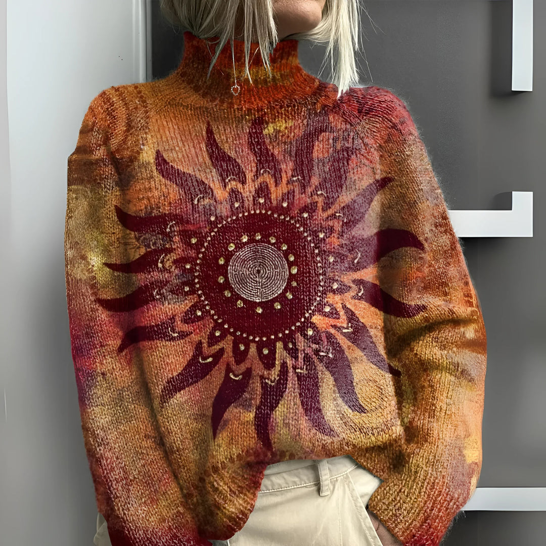 Eline - Warm knitted turtleneck with tribal sun